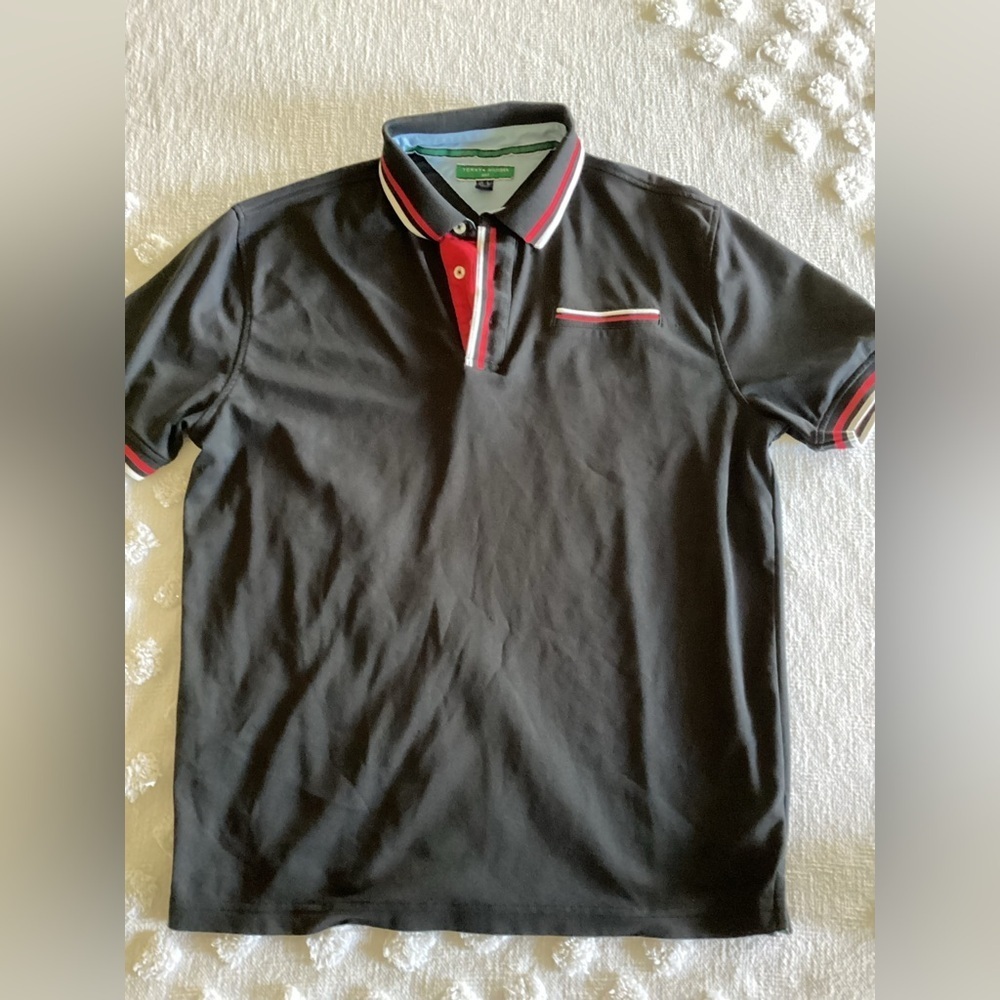 Tommy Hilfiger Golf polo-SZ L
PIT TO PIT 22”
Length 27”
AK